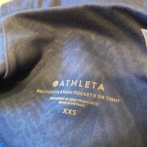Athleta Salutation stash pocket ll 7/8 Tight XXS